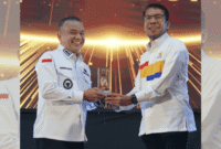 Walikota Palu Hadianto Rasyid saat menerima penghargaan, Rabu 28 Mei 2025