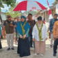 Wakil Bupati Hj.Surya, S.Sos,M.SI bersama Ketua TP-PKK Tojo Una-Una Ibu Hajar Lawidu disambut antusias masyarakat desa Bomba, Kecamatan Batudaka saat melakukan penilaian lomba desa, Rabu (28/5)