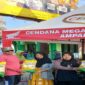 Bupati Tojo Una-Una, Ilham Lawidu, memimpin Car Free Day (CFD) “Maimo Molinja” dan penyaluran beras Stabilisasi Pasokan dan Harga Pangan (SPHP).