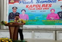 Bupati Tojo Una-Una, Ilham Lawidu saat memberikan sambutan pada acara pisah sambut Kapolres, Sabtu (19/7/2025).