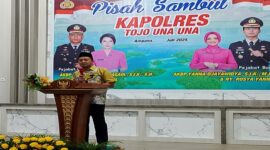 Bupati Tojo Una-Una, Ilham Lawidu saat memberikan sambutan pada acara pisah sambut Kapolres, Sabtu (19/7/2025).