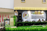 Wakil Bupati Tojo Una- Una Hj.Surya, S.Sos, M.Si saat membacakan pidato pertangungjawaban pelaksanaan APBD tahun 2024 dalam Rapat Paripurna DPRD, Senin 30 Juni 2025.