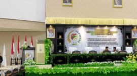 Wakil Bupati Tojo Una- Una Hj.Surya, S.Sos, M.Si saat membacakan pidato pertangungjawaban pelaksanaan APBD tahun 2024 dalam Rapat Paripurna DPRD, Senin 30 Juni 2025.