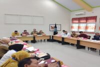 Pj Sekda Tojo Una-Una Alfian Matajeng saat menyampaikan materi dalam Rapat Koordinasi Pengembangan dan Pembinaan Kota/Kabupaten Tanggap Ancaman Narkoba tahun 2025 pada Selasa (8 Juli 2025).