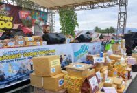 Ketua TP-PKK Tojo Una-una Ibu Hajar Lawidu,S.Kep.NS saat menyampaikan laporan kegiatan pada peluncuran Car Free Day Gerakan 6.000 Langkah Maimo Molinja, Minggu (22/6)