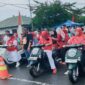 Wakil Bupati Tojo Una-Una, Hj. Surya, S.Sos, M.Si saat mengambil Star Lomba Motor  Lambat dibagian Kiri Depan menggunakan Mio Warna Putih, Ahad (10 /8/ 2025)