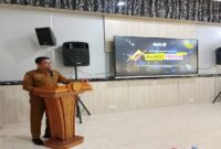Kepala BPKAD Touna,Dr. Rismanto saat menyampaikan laporan pembukaan launching Aplikasi AVATAR, di Ruang Kantor Bupati Senin 20/10/2025).