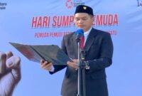 Pimpinan Cabang BRI Poso Nofiar Jakananda saat membacakan sambutan CEO BRI Heri Gunardi pada Hari Sumpah Pemuda, 28 Oktober 2025