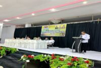 Plt. Kepala Dinas Ketahanan Pangan, Tanaman Pangan, Hortikultura dan Peternakan Touna,Albar Amir, S.T. M.Si.,saat menyampaikan laporan selaku ketua panitia kegiatan Rembug Madya KTNA.