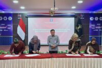 Ketua Poasbakumdin Tojo Una-Una, Nasrun, S.H, saat melakukan Penandatanganan Perjanjian Bantuan Hukum di Kantor Kanwil  Kemenkum Sulawesi Tengah, Selasa (10/3/2026)