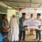 Bupati Banggai Kepulauan, Rusli Moidady, menyerahkan bantuan sapi kurban dari Presiden Republik Indonesia di Masjid Ar-Rahman, Desa Ambelang, Kecamatan Tinangkung, Rabu (27/5/2026).