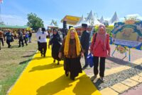 Wakil Bupati Tojo Una-Una Surya Lapasiri menghadiri puncak peringatan HUT ke-18 Kabupaten Sigi, Rabu (24/6/2026).